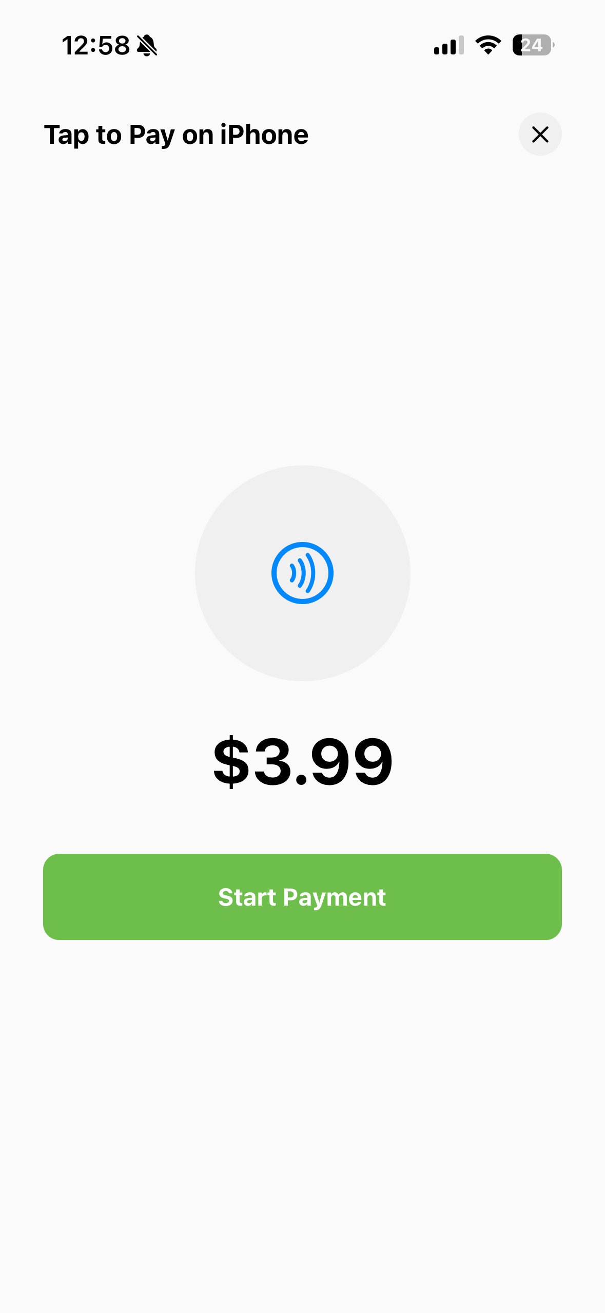 Customer tapping a contactless payment card or device